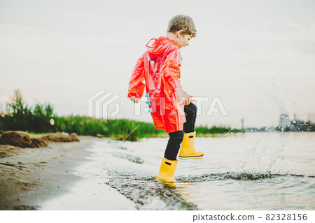 Yellow raincoat clearance red boots