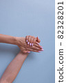 Pink manicure in beautiful style. Creative design. 82328201