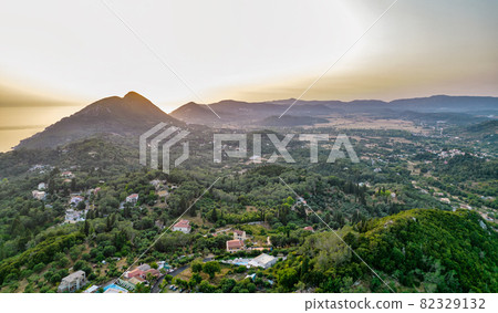 Sunset over coast of Corfu with Saint George mountain, Greece. Sunset over coast of Corfu with Saint George mountain, Greece. 82329132
