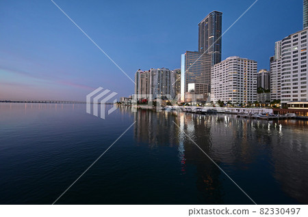 City of Miami, Florida skyline reflected in Biscayne Bay in pre dawn light. 82330497
