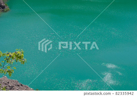 Background from emerald green water saturated with radon Background from emerald green water saturated with radon 82335942