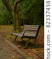 Autumn, quiet park bench 82337438
