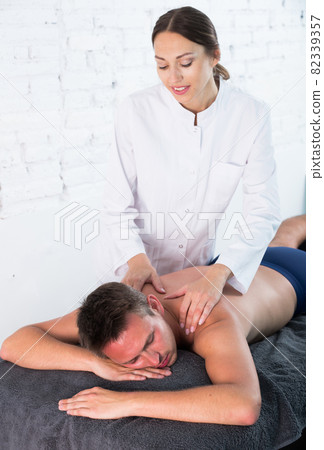 Relaxing massage for man in spa Relaxing massage for man in spa 82339357