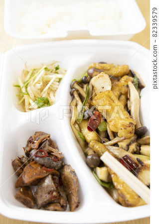 Delicious conger eel stir-fried in Sichuan style and rice takeout Delicious conger eel stir-fried in Sichuan style and rice takeout 82339579