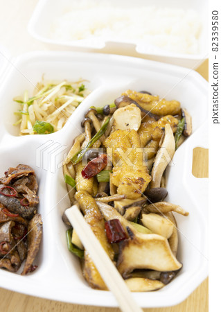 Delicious conger eel stir-fried in Sichuan style and rice takeout Delicious conger eel stir-fried in Sichuan style and rice takeout 82339580