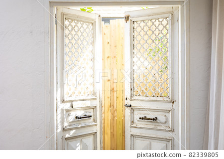 White door with natural light 82339805