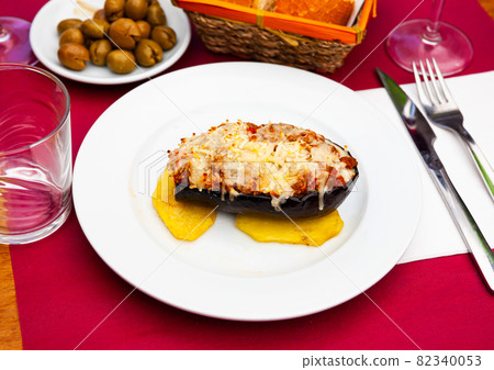 Baked eggplant stuffed with meat and bechamel sauce - spanish dish Baked eggplant stuffed with meat and bechamel sauce - spanish dish 82340053