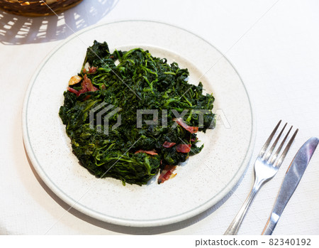 Catalan Spinach served on table Catalan Spinach served on table 82340192
