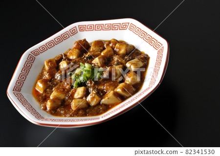 Photographed Sichuan Mapo tofu with a lot of tofu on a black background 82341530
