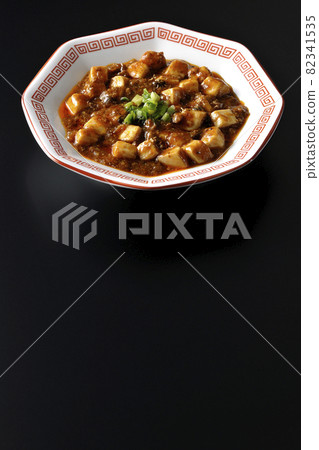 Photographed Sichuan Mapo tofu with a lot of tofu on a black background 82341535