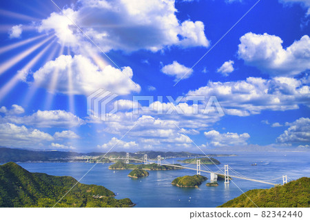 Sun rays shining into the Shimanami Kaido / Kurushima Kaikyo Bridge 82342440