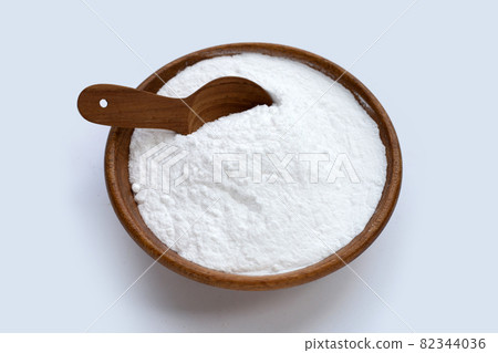 Baking soda on white background. 82344036