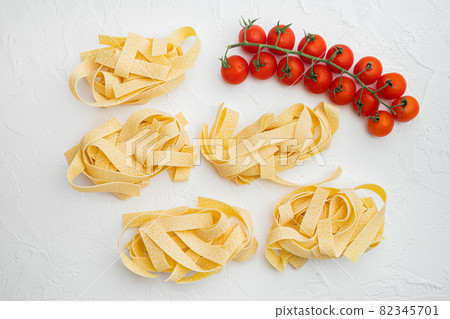 Pasta ingredients, on white stone table background, top view flat lay 82345701