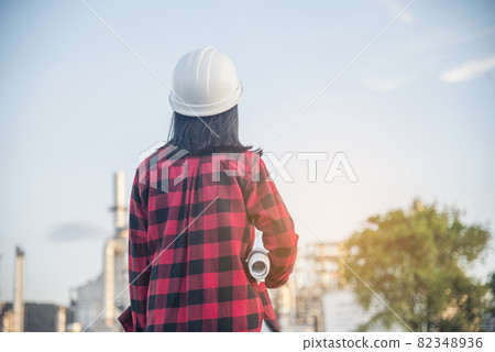 Engineer woman hands holding hardhat white work helmet hard hat for Construction Engineering. Refinery woman engineer oil industry hands hold worker helmet hard hat. Refinery industry engineering Engineer woman hands holding hardhat white work helmet hard hat for Construction Engineering. Refinery woman engineer oil industry hands hold worker helmet hard hat. Refinery industry engineering 82348936