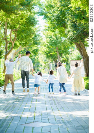 Three generations family connecting hands Three generations family connecting hands 82350368