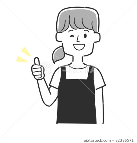 一個穿著圍裙的職員豎起大拇指 一個穿著圍裙的職員豎起大拇指 82356571