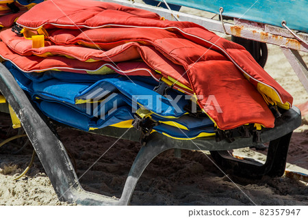 Life jackets, protection and safety of life on the water against the background of the sea 82357947