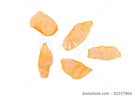 Dried orange peels isolated on a white background, close-up 82357968