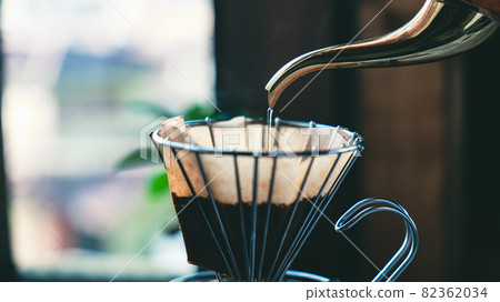 Scene of pouring hot water into coffee Scene of pouring hot water into coffee 82362034