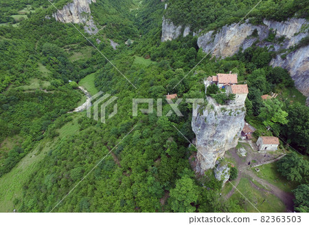 Katskhi pillar and the Orthodox Church on it, filmed in Georgia, from the air quadrocopters Katskhi pillar and the Orthodox Church on it, filmed in Georgia, from the air quadrocopters 82363503