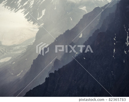 Soft focus. Dramatic sky on mountain peaks. Mystical background with dramatic mountains. Rain in mountains. Rainy mountain natural background. Soft focus. Dramatic sky on mountain peaks. Mystical background with dramatic mountains. Rain in mountains. Rainy mountain natural background. 82365783