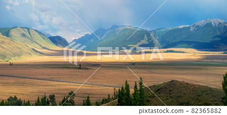 Kurai steppe. Awesome panoramic alpine view from pass to mountai Kurai steppe. Awesome panoramic alpine view from pass to mountai 82365882
