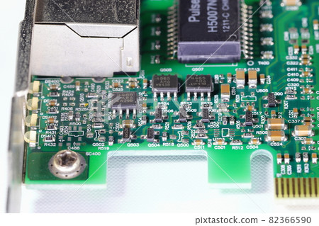 Old Printed Circuit Board with many electrical components. Old Printed Circuit Board with many electrical components. 82366590