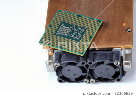 Close up Hight performance CPU with active Aluminum and copper heatsink isolated on white background. Close up Hight performance CPU with active Aluminum and copper heatsink isolated on white background. 82366639