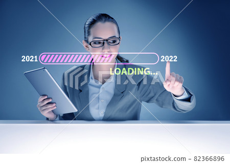 Businesswoman pressing virtual button with year 2022 Businesswoman pressing virtual button with year 2022 82366896