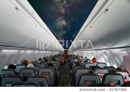 Aircraft interior with star and Milky way on ceiling of the airplane 82367966
