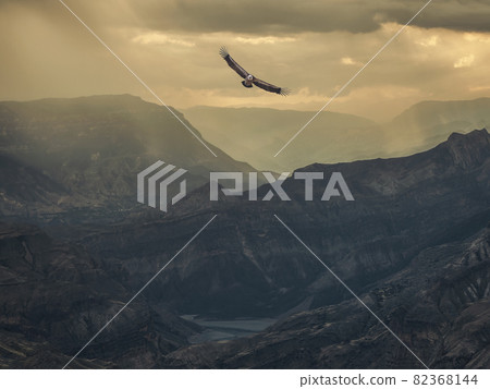 Dramatic sky on mountain peaks. Mystical background with dramatic mountains. Rain in mountains. 82368144