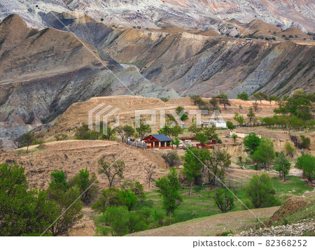 A farm house in a gorge among the mountains. High-mountain village of Salta, Dagestan. 82368252