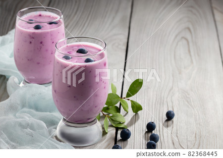 Homemade blueberry yogurt smoothie. Protein shake with berries. Copyspace 82368445
