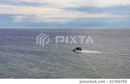 Movement of  speedboat before  storm on Lake Baikal. 82368789