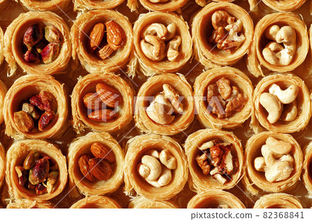 Background of traditional arabic dessert Baklava with honey and nuts 82368841