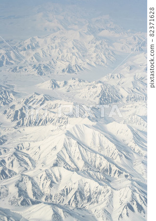 View of the mountains covered with snow. Chukotka, Russia. View of the mountains covered with snow. Chukotka, Russia. 82371628