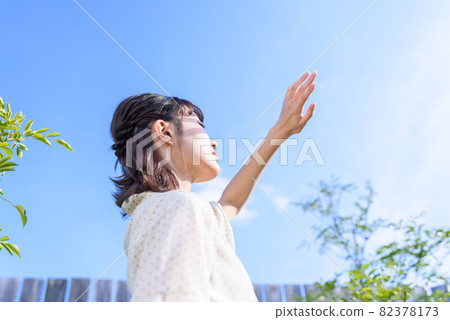 A woman in sunlight 82378173