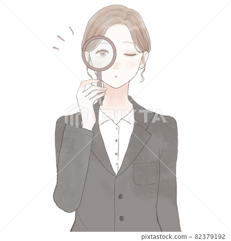 A woman in a suit checking with a loupe A woman in a suit checking with a loupe 82379192