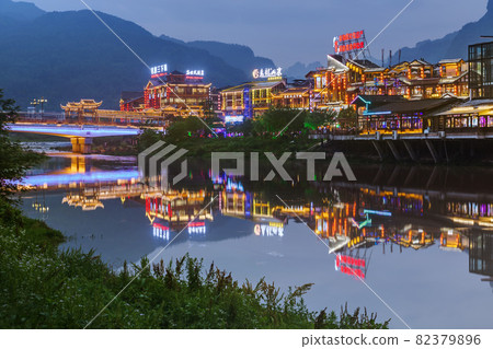 Wulingyuan, China - May 27, 2018: Town Wulingyuan at sunset in Tianzi Avatar mountains nature park 82379896