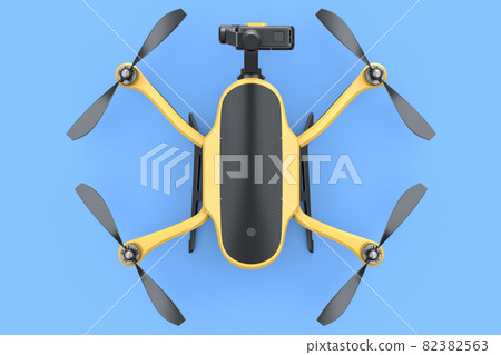 Flying photo and video drone or quad copter with action camera isolated on blue Flying photo and video drone or quad copter with action camera isolated on blue 82382563