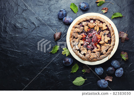 Appetizing plum cake,copy space Appetizing plum cake,copy space 82383030