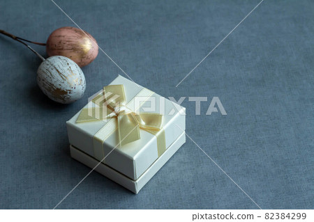 Image of a small gift box with a small ribbon Image of a small gift box with a small ribbon 82384299