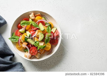 Tuscan Panzanella with tomatoes and bread. Top view. 82384396