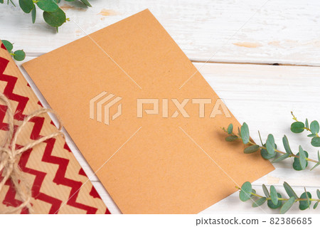 Christmas present with greeting card close up Christmas present with greeting card close up 82386685