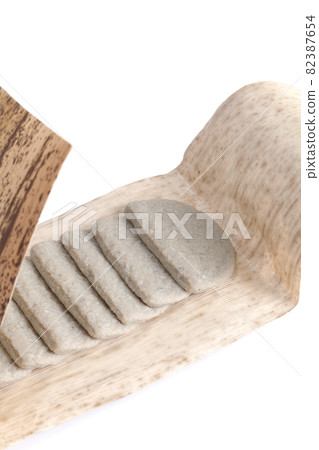 Black hampen wrapped in bamboo skin [white background] 82387654