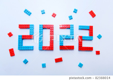 New year, 2022. Lettering from a children's constructor on a white background. Toys in isolation. copy space. The concept of a hobby and learning New year, 2022. Lettering from a children's constructor on a white background. Toys in isolation. copy space. The concept of a hobby and learning 82388014