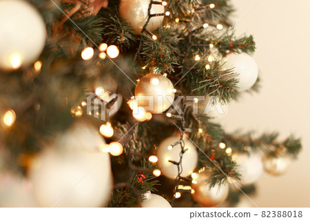 holidays, new year, decor and celebration concept - close up of christmas tree decorated with balls and toys holidays, new year, decor and celebration concept - close up of christmas tree decorated with balls and toys 82388018