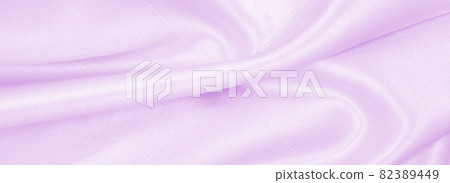 Smooth elegant lilac silk or satin texture as wedding background. Luxurious background design Smooth elegant lilac silk or satin texture as wedding background. Luxurious background design 82389449