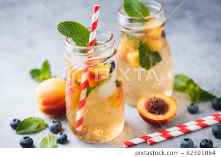 Refreshing cold peach lemonade Refreshing cold peach lemonade 82391064