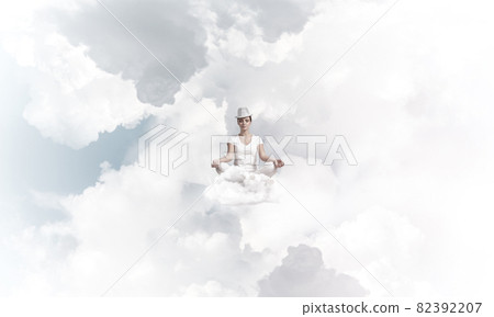 Young woman keeping mind conscious. 82392207